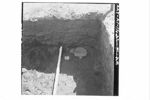 Broken metate and mano in debris in sect. N54.9E, 2.7' below surface at N53.8E a