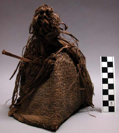 Woven fibre hat ("sop"). Made by women; worn by men