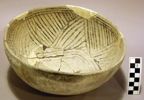 Ceramic bowl, black on white interior, reconstructed