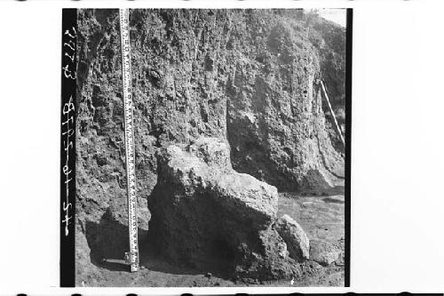 Cairn over burial after excavation of surrounding debris.