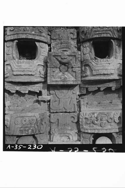 Detail of ear plug of mask. Structure 2C6 (Casa 1); West facade