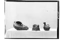 Pottery vessels (3); Shoe-shape - brown ware; Tripod - Pol. red - no rattles in