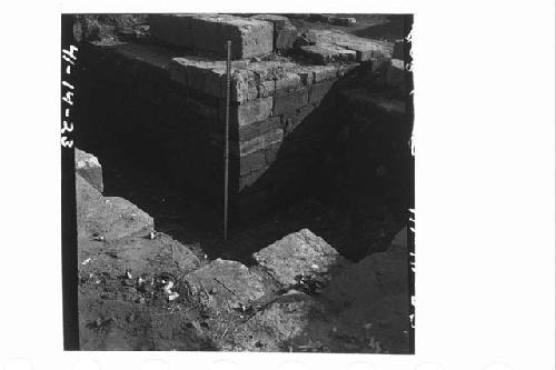 NW corner of interior platform of cut stone blocks.  Photo from above exterior w