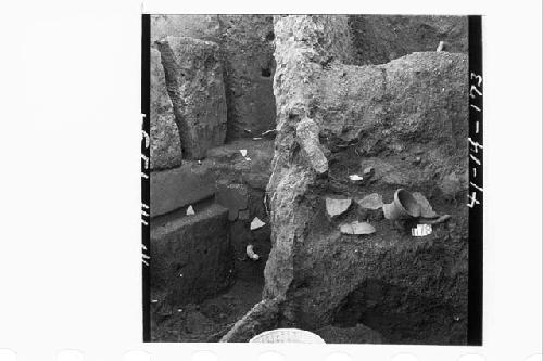 Broken kantharos-shape pot in situ in debris in sect. N71.18W (cat. No. 40b-1-1/