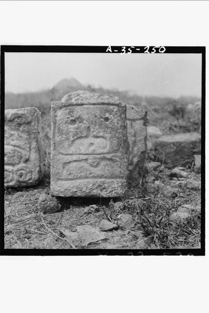 Individual stone from glyphic altar, Str. 2B2