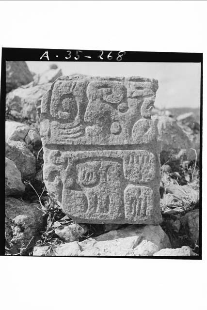 Individual stone from glyphic altar, Str. 2B2