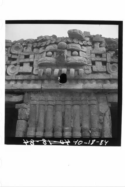 Mask, S. facade of palace 2nd story