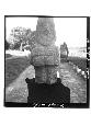 Front view, small standing stone human figure f found on Altar A.  Mound 1-N.  S