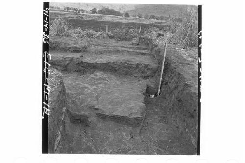 NW interior corners of Plaza showing corner of lowest terraces above floor and t