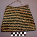 Small bag of blue and natural color basket weave, striped pattern; thin grass ha