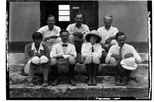 Staff sitting on west porch of hacienda