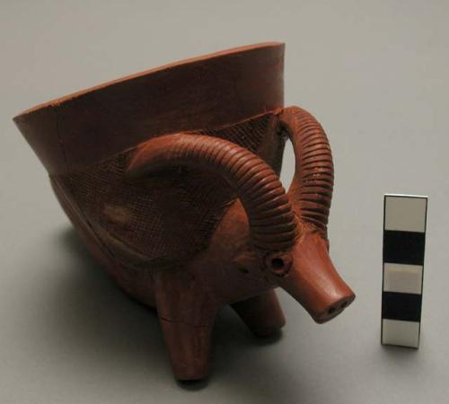 Red clay pipe bowls, decorated with animal figures - 4 antelope(?) 1 water buffa