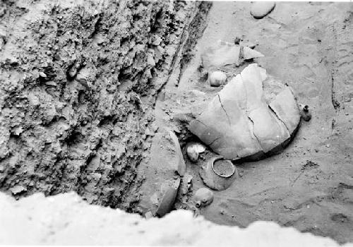 Burial pit marked " Cerro de Trinidad, Burial 1&2 , Pit 7. Close up before remov