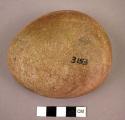 Ground stone tool (silicified s.s.)