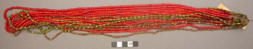 Necklace of red & gold colored beads