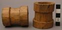 Loom, portion of, carved wood pulleys?, hollow, cylindrical, wide center groove