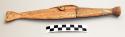 Knife and sheath. 11.5 in. l.; wood has been carved at both ends; rawhide attach