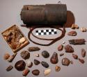 Salt box and contents, consisting of 35 various objects probably used as fetishe