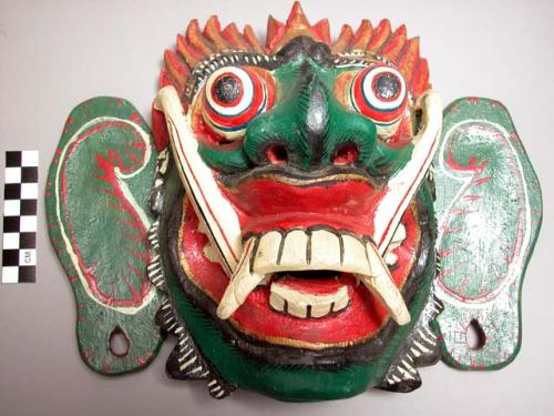 Mask, green with red, white, gold, and blue details painted