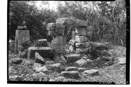 Temple of Initial Series showing lintel with date glyphs on center supports