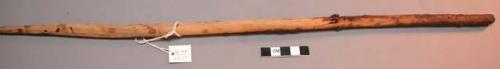 Wood, Prayer stick, pointed at one end, undecorated, with charred concretions