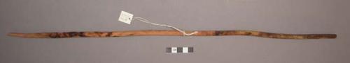 Wood, Prayer stick, pointed at both ends, traces of green on upper half, undecor