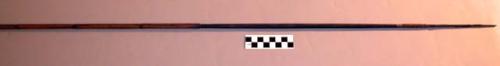 Long arrow of dark bamboo shaft and broken bone barbs, delicate +