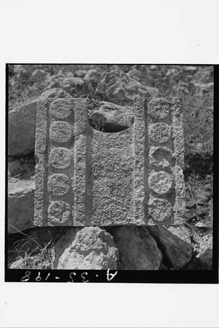 Yolk-shaped sculptured stone, Structure 2C6 (Casa 1)