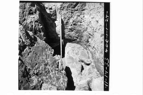 E-W wall of Phase I on N side of Md. 1 and fragments of collapsed portion of the