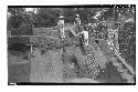 Men standing on top of pyramid 5; Mound A