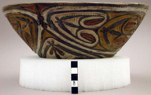 Bowl with carved and painted design