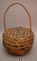 Mad weave basket with handle