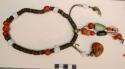 Rosary of bone, coral, silver, malachite beads