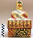 Square basketry box with 3-tiered pagoda-like top. Geometric design +