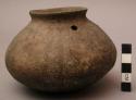 Small pottery olla with suspension holes