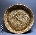Circular basket trays, woven of palm leaf
