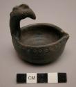Pottery dish, bird-head handle