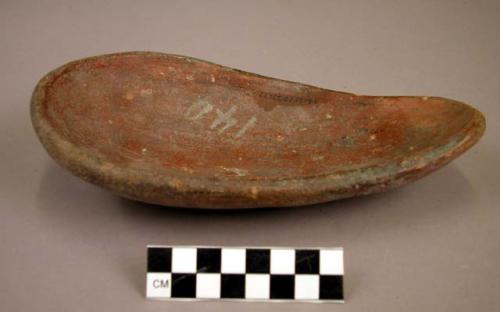 Red pottery ladle