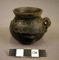 Ceramic jar, black polished ware, incised shoulder, perforated lug handle