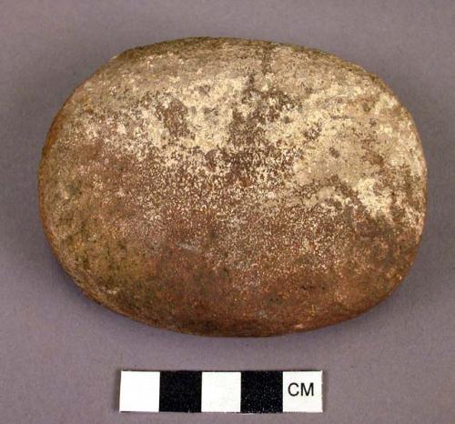 Stone pestle for grinding in metate