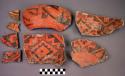 Sherds of black on red ware. 10 rims (5 decorated interior and exterior, 4 inte