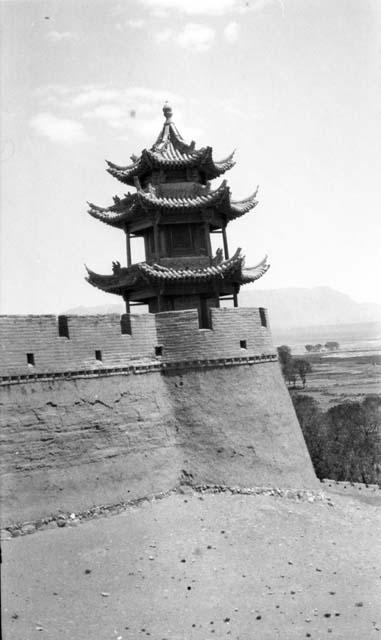 Wall and tower with pointed roofs