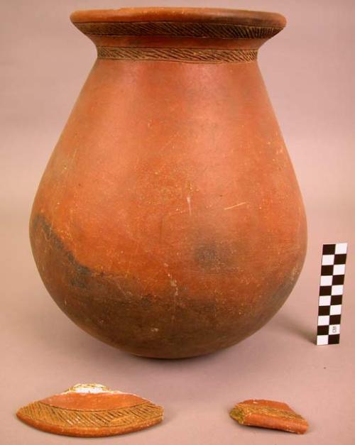 Large jar, red ware.  Incised decoration.