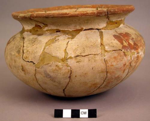 Fragmentary vessel- white slip, red painted design- flared neck