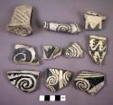 Sherds - vessel feet or handles?; McElmo black and white