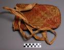 Men's carrying basket ("yukli"), made by women. Ends tied and worn +