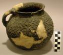 Ceramic jar, corrugated, 1 handle, reconstructed