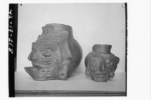 Two Plumbate Human Head Jars