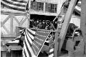 Flag draped gangway leading to ship