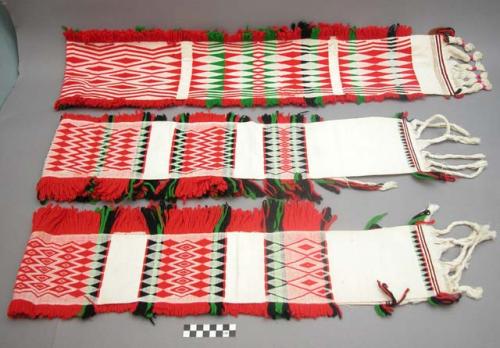 Sashes woven and worn by men on ceremonial occasions (white cotton +